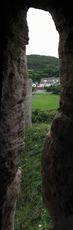 SX23465-71 Conwy medieval wall through arrow slit.jpg